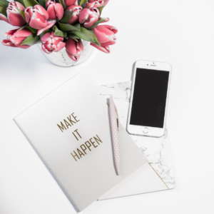 Caderno com frase motivacional